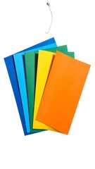 Fototapeta premium Assorted colorful rectangular shapes fanned out, suspended above, on white