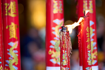 Bangkok, Thailand - 24th December 2025: Candles at San Chao Mae Guan Yin (Mulanithi Thian Fah)