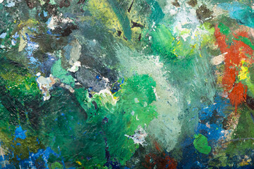 Colorful abstract painting painted with palette knife and brush in oil paint in green shades