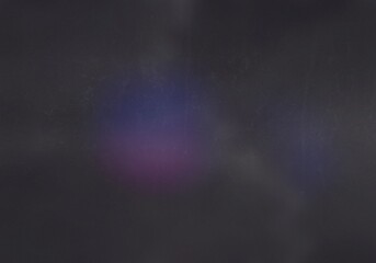 
Soft indigo and violet glow spots floating on charcoal grain, vintage photo look overlay for...