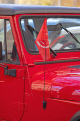 Smiley Flag at Top of Radio Antenna Red All Terrain Vehicle