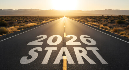 Desert highway with 2026 S T A R T painted on asphalt