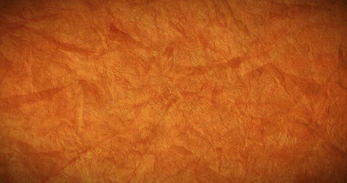 Abstract orange old rough grunge rustic paper texture background. Color gradient background. Noise grainy bright light motion animation template. 4K