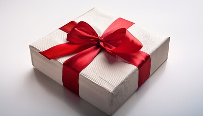 Obraz premium Gift Box With Red Bow On White Background For Christmas