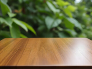 Wooden surface with green leaves background