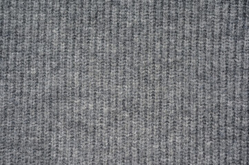 close-up texture of a knitted gray sweater