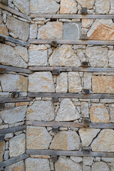 Close-up detail of the characteristic stone and timber-framed wall texture of buttoned houses.