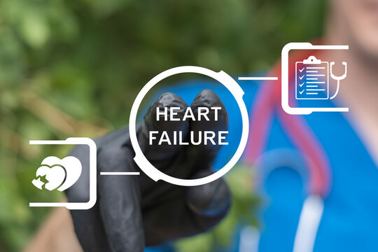 Cardiologist using virtual touch screen presses the text HEART FAILURE. Heart failure - medical concept for heart diseases diagnostics.