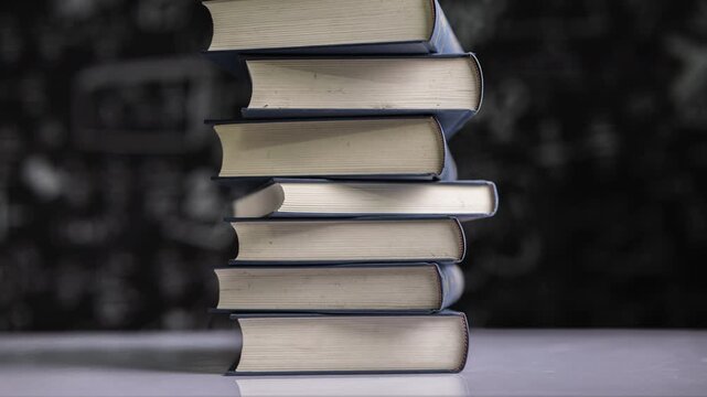 Stop motion of stack pile of books