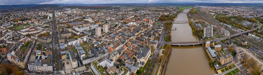 Naklejka premium A panoramic aerial view of the old town city Thionville in France on a cloudy fall noon.