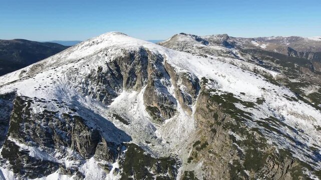 Amazing Aerial Autumn landscape of Rila Mountain near Mechit and Popova Kapa peaks, Bulgaria