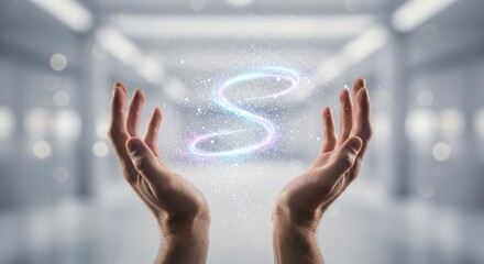 Two hands hold a glowing, swirling energy that sparkles with light against a blurred backdrop.