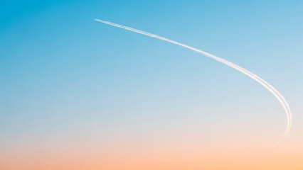 Airplane Trail Across Clear Sky on Blue Gradient Background &mdash; Minimal Travel Concept with Large Copy Space