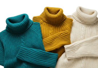 high-key flat lay of three thick, oversized cashmere cable knit sweaters (teal, mustard, cream) on transparent, volumetric lighting highlights plush texture, luxury fashion catalogue concept