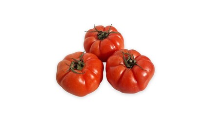 Ripe organic red beefsteak tomatoes on a white background