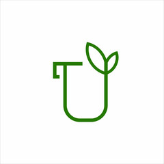 Natural drink logo design with mug and leaf illustration.