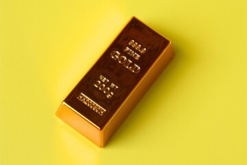 gold bars isolated on yellow