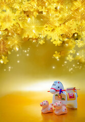 きらめく金背景と午年