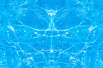 Blue water with ripples on the surface. Defocus blurred transparent blue colored clear calm water surface texture with splashes and bubbles. Water waves with shining pattern texture background.
