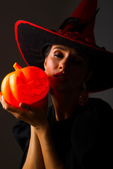 Halloween, woman witch with a broom. Halloween woman. Autumn. People. Dark 

