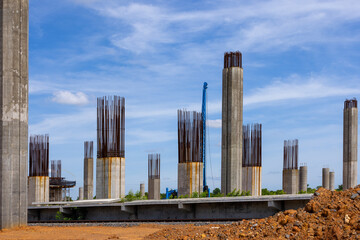New construction site with crane and mechanical equipments on daylight sky background. construction industry. High-speed train of Chinese made For Thailand. Transportation infrastructure construction.