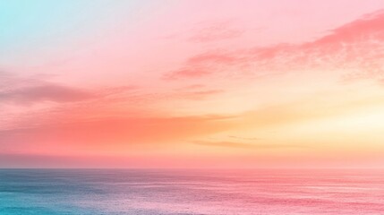 Obraz premium Pastel sunset over calm ocean; tranquil background for design