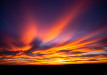 A breathtaking display in the sky with sun rays shining through dramatic clouds, creating a truly divine light effect across the vibrant horizon at golden hour