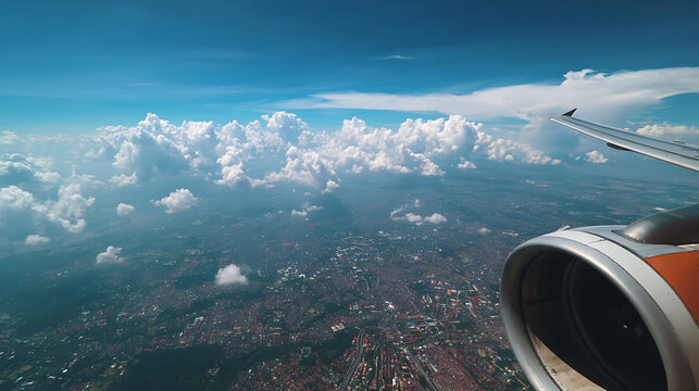 A panorama of a cityscape being viewed from the seat of an airplane, halfway through the journey (2)