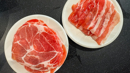 Pork slide in the plate for cooking in shabu pot