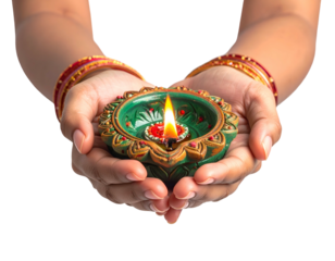 Hands cupping a lit, decorative oil lamp