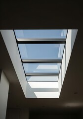 Modern skylight design featuring geometric glass and architectural precision