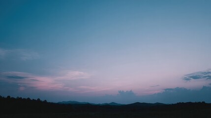 Fototapeta premium completeness. Serene twilight landscape with soft gradient sky, minimalistic natural scenery. travel magazines, destination branding, designed for outdoor magazines and nature guides.