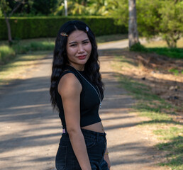 Thai Girl at Resort and Gardens in Thailand