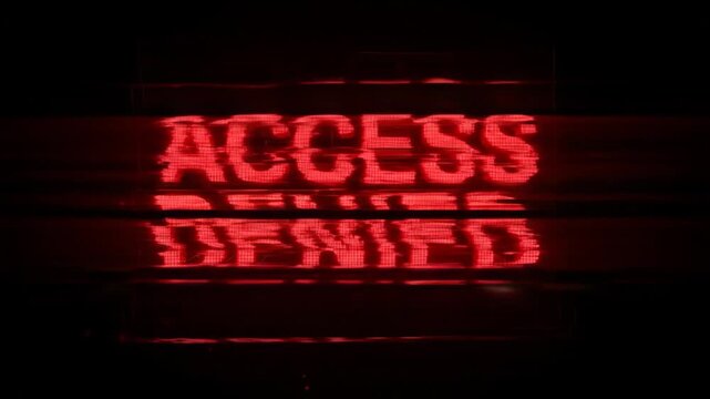 Glitchy red 'ACCESS DENIED' message on a dark background, featuring a vibrant, digitally enhanced, retro-futuristic error display