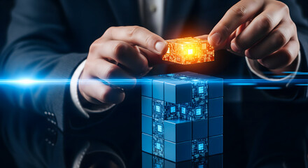 Hand placing detailed glowing orange block onto blue cube stack symbolizing system integration and completion