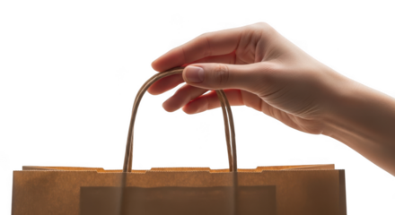 Hand holding brown paper bag isolated on transparent background