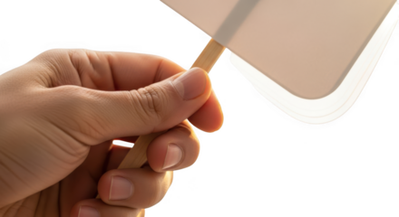 Hand holding a smartphone with a stylus isolated on transparent background