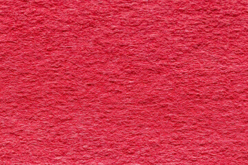 ざらざらした赤色の壁