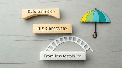 Creative visual representation of risk recovery concepts with colorful umbrella, wooden blocks, and bridge model on a neutral background