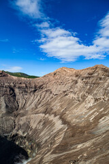 The Bromo, or Mount Bromo, is an active somma volcano, a Hindu pilgrimage site, and part of the Tengger mountains, in East Java, Indonesia.
