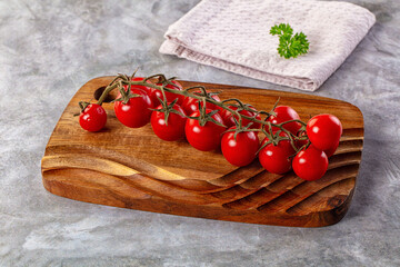 Ripe sweet cherry tomato branch