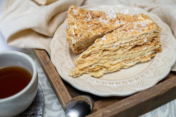 Layered cake with cream Napoleon, vanilla sliced flaky crumb cake.