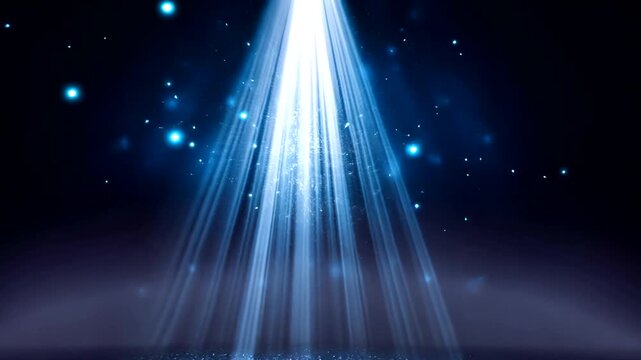 Dramatic blue spotlight illuminates a sparkling stage with floating particles