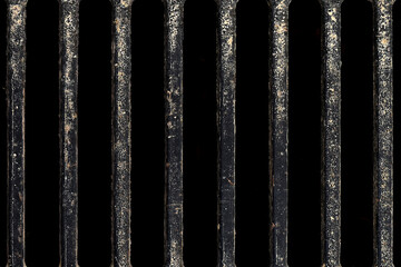 Metal Grate Industrial Texture. Dark metal grate with vertical bars and strong contrast. Industrial texture for backgrounds and graphic design.