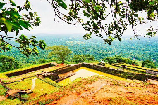 Hill top view of the many tanks and reservoirs with the multi level foundations of the ancient citadel of Sigiriya,The Lion Rock,Palace of King Kashyapa,5th century CE,Central Provinces,Sri Lanka