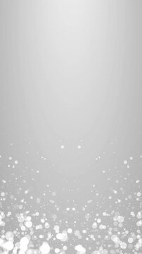 Elegant white dust particles with light bokeh slowly drifting in motion. Full HD. 4K