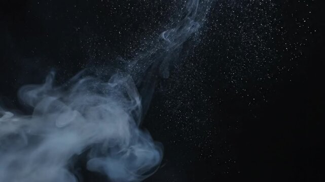 Smoke Rising Against Dark Background Slow Motion.