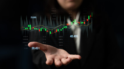 A business professional showcases stock market data with virtual graphs and numbers in a sleek dark setting, highlighting investment growth and analysis trends. Scalp