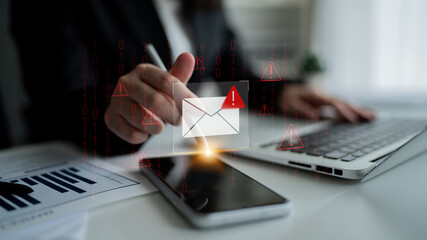 Phishing email alert concept showing digital envelope with warning sign represents data theft, network breach, and email security threats. Parse © InfiniteFlow