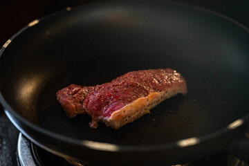 Fototapeta premium frying pan with meat